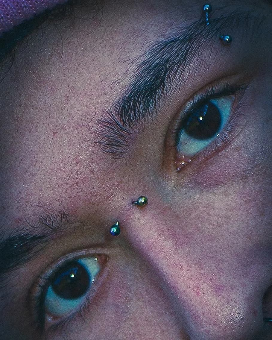 Nico with a nose piercing